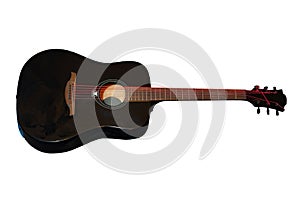 black shiny acoustic guitar with red strings, mahagony fretboard and picks isolated on the white photo