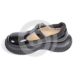 Black shiny glossy comfortable leather women's sandals on a thick rubber sole on a white background