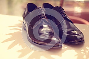 Black shiny men shoes