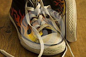 Black shoes with fire photo
