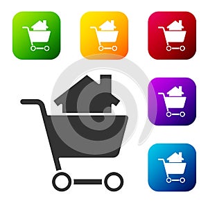 Black Shopping cart with house icon isolated on white background. Buy house concept. Home loan concept, rent, buying a