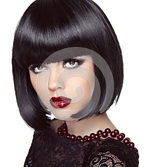 Black short bob hairstyle. Fashion brunette girl model with make