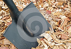 Black shovel and mulch