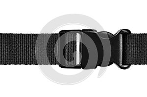 Black side release acculoc buckle plastic clasp, quick nylon belt rope lock strap isolated macro closeup large detailed horizontal