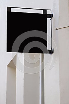 Black signboard on wall. Square shape mock up.
