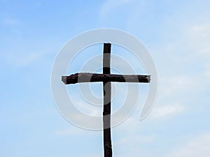 Black silhouette on the background of the crucifixion of Jesus Christ It is hope