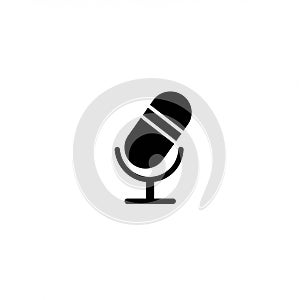 Black silhouette of a classic microphone on a white background. The design features a