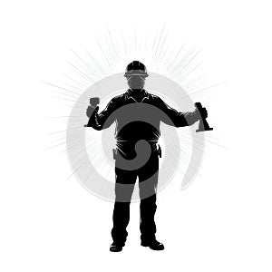 Silhouette of a construction worker holding tools