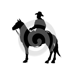 Black silhouette of cowboy on horse. Isolated image of american rider. Western landscape photo