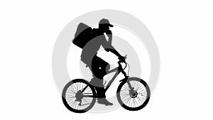Black silhouette of delivery man with backpack refrigerator riding a bicycle talking on smartphone isolated on white