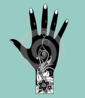 Black silhouette of a female hand with a tattoo of white floral ornament