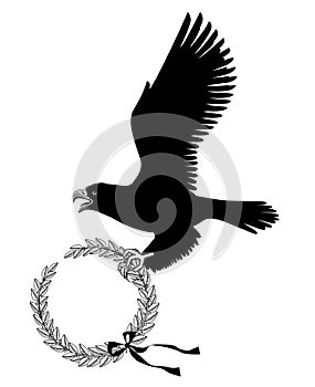 Black silhouette of flying eagle with round laurel wreath in its claws