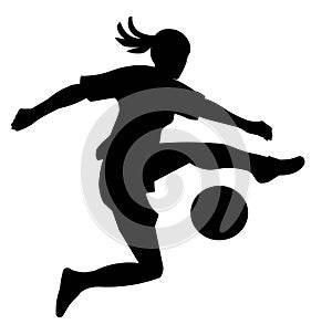 Black silhouette of a girl in a sports uniform playing football jumpimg high to kick the ball