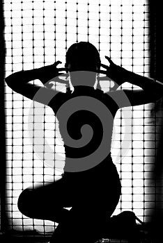 Black silhouette of a girl on a white background