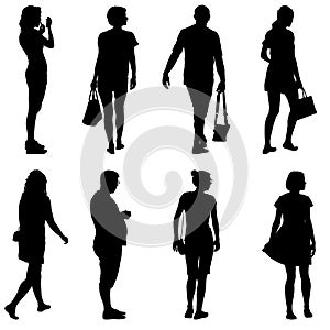 Black silhouette group of people standing in various poses