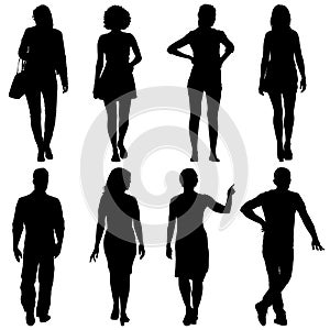 Black silhouette group of people standing in various poses