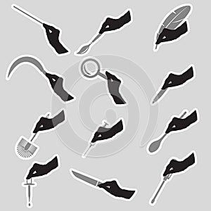 Black silhouette of hands with various tools stickers photo