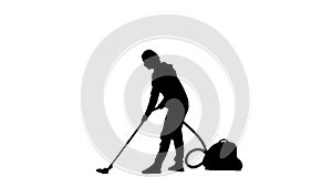 Black silhouette of housewife woman vacuum the floor on white background. Concept profession of maid, cleaning