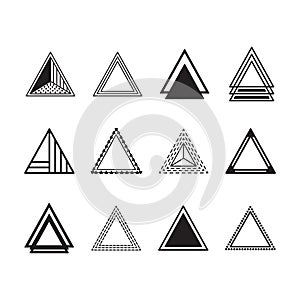 Black silhouette and line equilateral triangles motifs and icons set on white photo