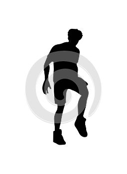 Black silhouette of a man playing soccer editable vector graphic