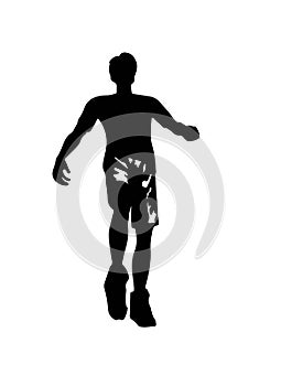 Black silhouette of a man wearing soccer uniform playing ball in the field.