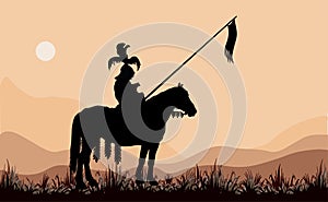 Black silhouette of a medieval knight  on a horse, against the sky