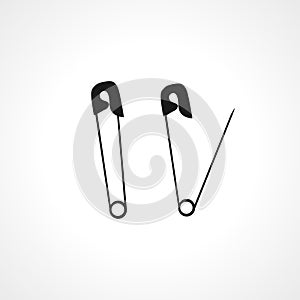 Black silhouette of a open and closed safety pin icon. safety pin vector icon. safety pin isolated icon photo