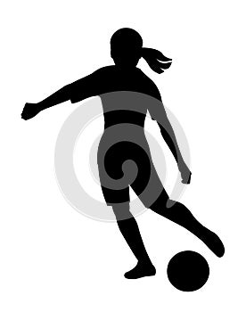 Black silhouette of playing women's football child girl dribbling the ball on the field and going to kick a ball