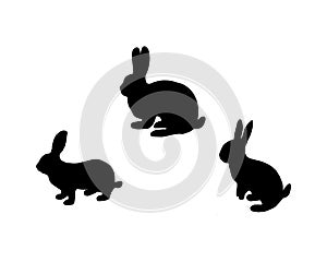 Black silhouette of three bunnys