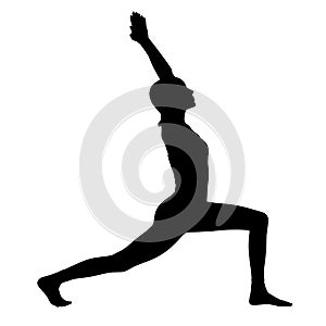 Black silhouette of woman doing yoga exercise.