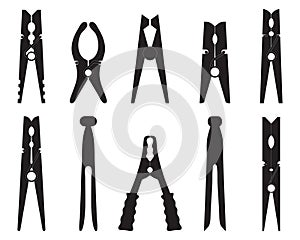 Black silhouettes of clothespins