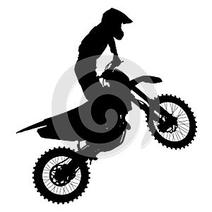 Black silhouettes Motocross rider on a motorcycle photo