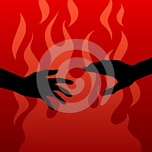 Black silhouettes of two hands on the red fire background