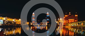 Black sky over the lake and Sri Harmandir Sahib Golden Temple Amritsar Punjab India