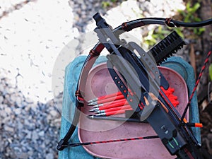 Black small modern handheld pistol crossbow with carbonfiber or glassfiber limb retro style. photo