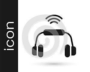 Black Smart headphones system icon isolated on white background. Internet of things concept with wireless connection