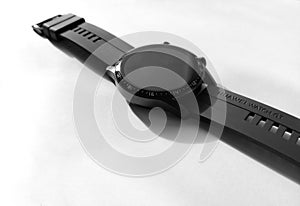 Black smart watch Huawei WATCH GT2 on a white table. Black watch on hand. Modern technologies. photo