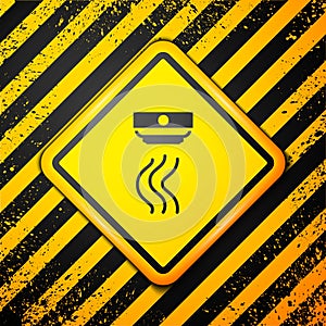 Black Smoke alarm system icon isolated on yellow background. Smoke detector. Warning sign. Vector