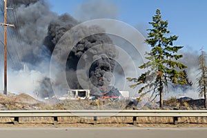 Black smoke from burning tires