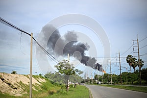 Black smoke from a smokestack factories.