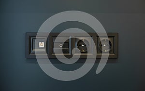 Black sockets on the wall