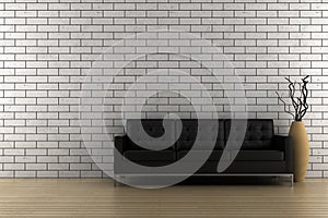 Black sofa and vase with dry wood