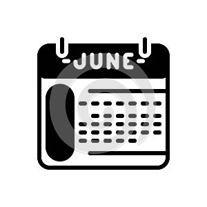 Black solid icon for June, calendar and book