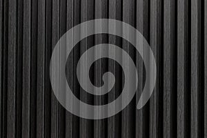 black solid wooden battens wall pattern background