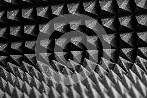 Black soundproofing professional with geometric patterns