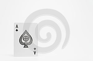 Black Spade Ace card on white background and selective focus