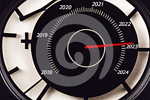 Black speedometer with cutoffs 2022, 2023, 2024. The concept of the new year and Christmas in the automotive field. Counting