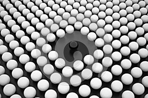 Black Sphere between Array of White Spheres