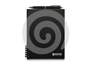 Black spiral bound notebook with pen on top isolated on white background