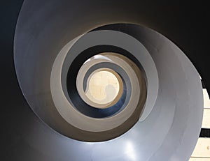 Black spiral staircase with abstract shape